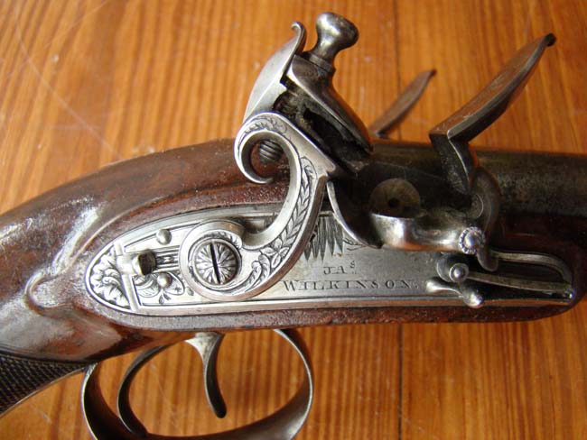 A fine pair of Double Barreled English Flintlock Coach Pistols by James Wilkinson, London, circa 1810, Gunmaker to His Majesty King George III. — image 4